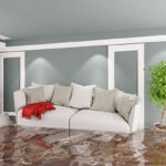 flooded living room needing water damage cleanup greensboro